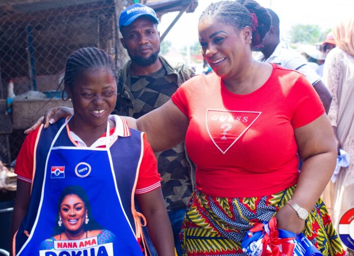 Ama Dokua in a hearty pose with a beneficiary of her empowerment initiative in the Okaikwei North Constituency.